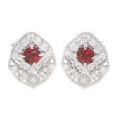 Round red garnet sterling silver earrings with moissanite accents, elegant and luxurious jewelry piece.